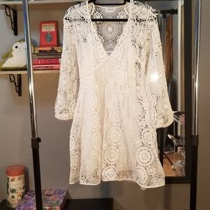 White long sleeve lace dress by bebe